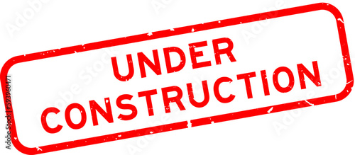Grunge red under construction word square rubber seal stamp on white background