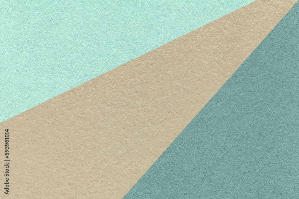 Texture of old craft cyan, teal and beige color paper background, macro. Vintage abstract cardboard Texture of old craft cyan, teal and beige color paper background, macro. Vintage abstract cardboard