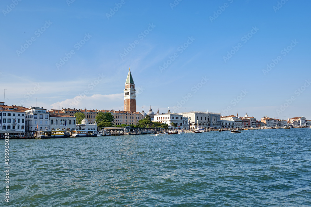 Venice: landscape with the image of boats on a channel in Venice, Italy