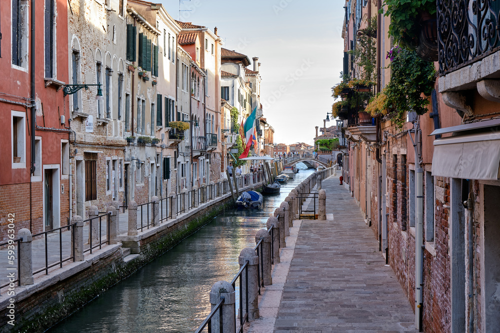 Venice: landscape with the image of boats on a channel in Venice, Italy