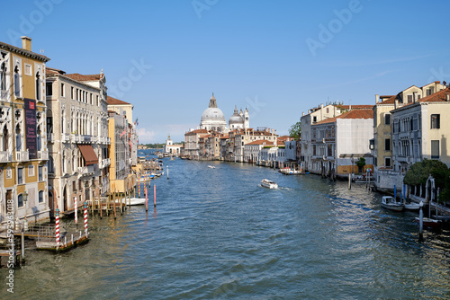 Venice  Italy  Panorama of Venice Grand Canal with boats and Santa Maria della Salute church on sunset from Ponte dell Accademia bridge. Venice  Italy