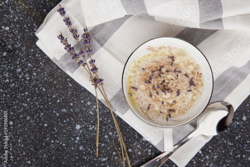 Aesthetic ruf lavender coffee with flowers close up photo