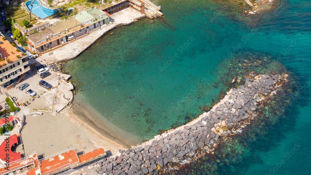 Aerial view of Marechiaro beach. It is located in the Posillipo district in Naples, Italy. It is a small artificial gulf of the Tyrrhenian Sea.