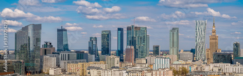 Warsaw city center under blue cloudy sky aerial landscape