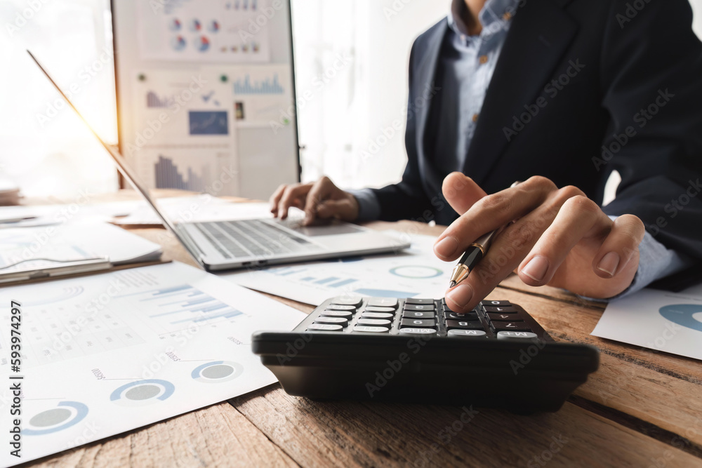 Fototapeta premium Bookkeeper or financial inspector hands making report, calculating. Home finance, tax, investment, economy, saving money or insurance concept