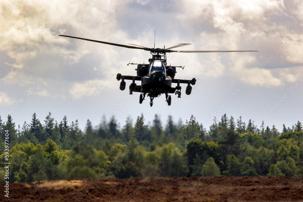 Attack helicopter hovering. Attack helicopter hovering.