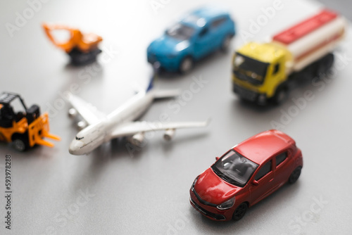 Figurine, toy car and toy airplane