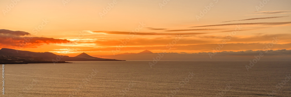 View on Teide and Teneriffe from gran Canaria at sunset, panorama.