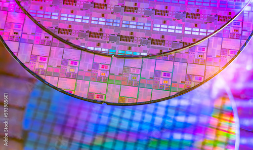 Silicon Wafers with microchips used in electronics for the fabrication of integrated circuits