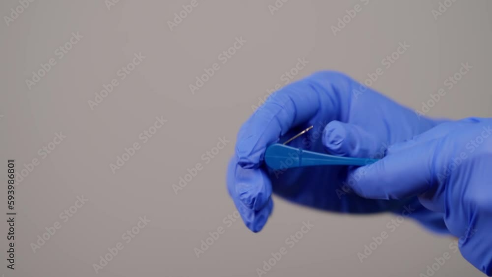 Activation Key for Palatal expander mechanism. Orthodontist in gloves holding Orthodontic plate Activation Key. Dentist specialist show professional equipment. Healthcare and medicine
Activation Key for Palatal expander mechanism. Orthodontist in gloves holding Orthodontic plate Activation Key. Dentist specialist show professional equipment. Healthcare and medicine