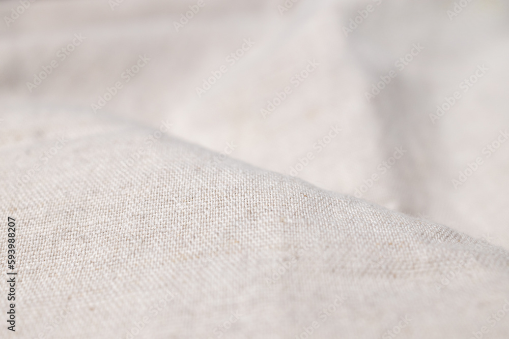 Natural linen fabric texture. Rough crumpled burlap background. Selective focus Natural linen fabric texture. Rough crumpled burlap background. Selective focus