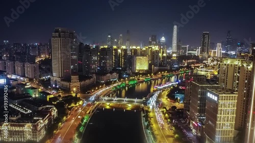 Wallpaper Mural Time lapse aerial cityscape footage of illuminated skyscrapers with fast cars at night Torontodigital.ca