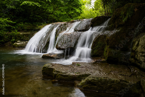 Fototapeta Naklejka Na Ścianę i Meble -  Spring waterfall in La Garrotxa, Girona, Spain