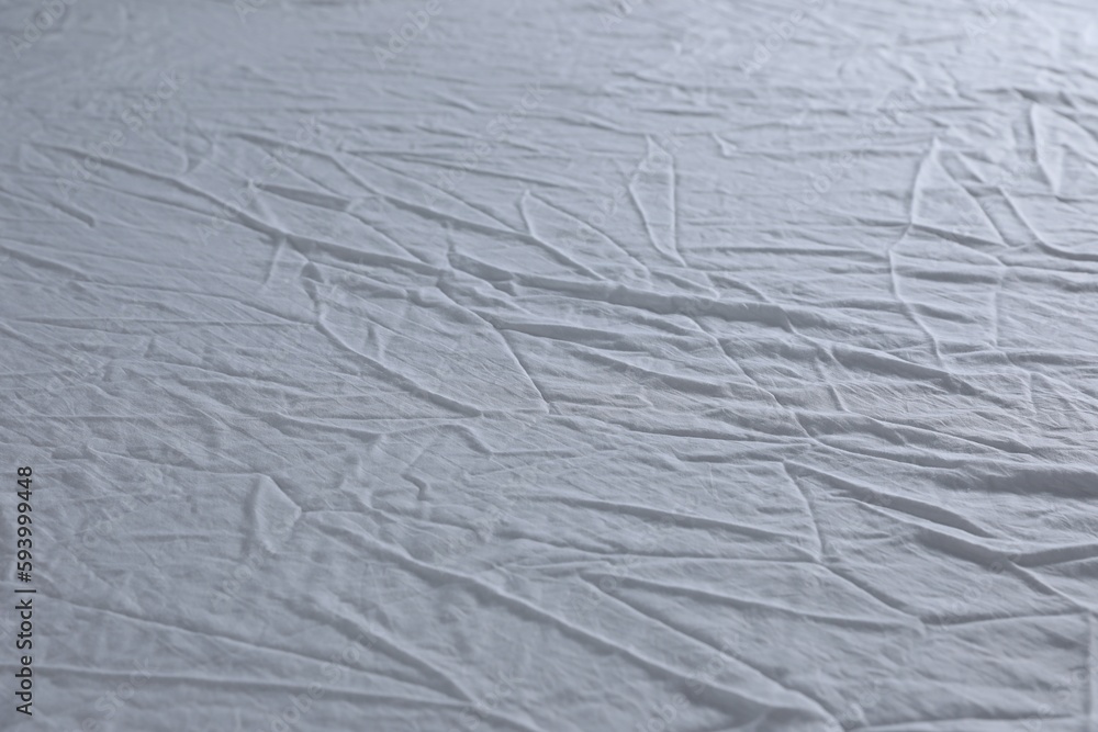 Crumpled white fabric as background, closeup view