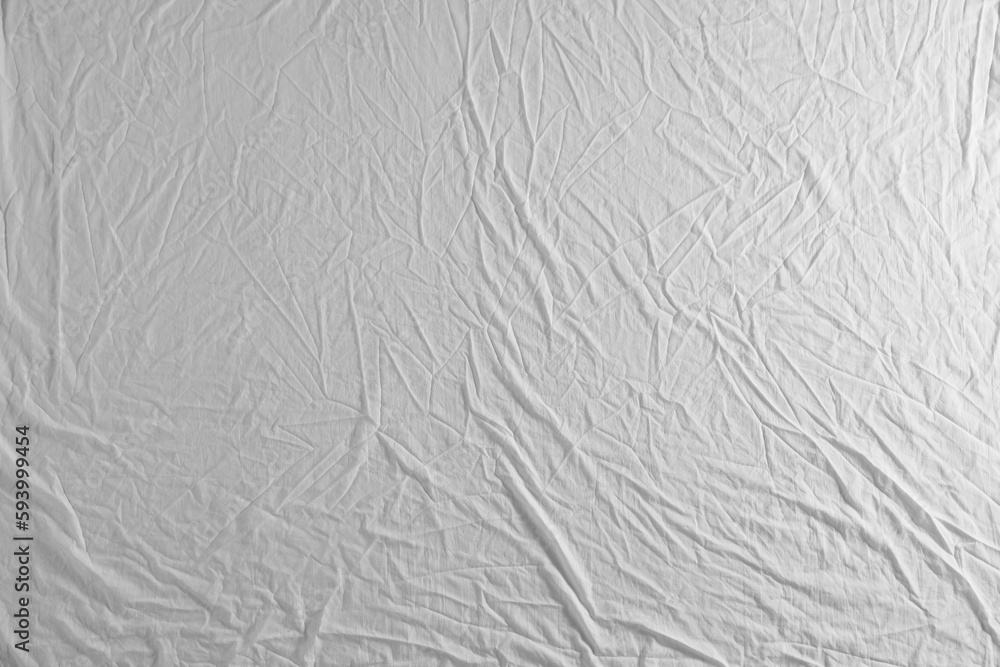 Crumpled white fabric as background, top view Crumpled white fabric as background, top view