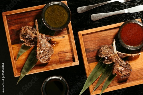 Εκτύπωση καμβά a top view of perfectly made tomahawk steak on wooden boards