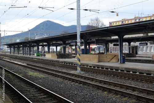 Lovosice, Czechia - April 16, 2023: train station and Lovos hill