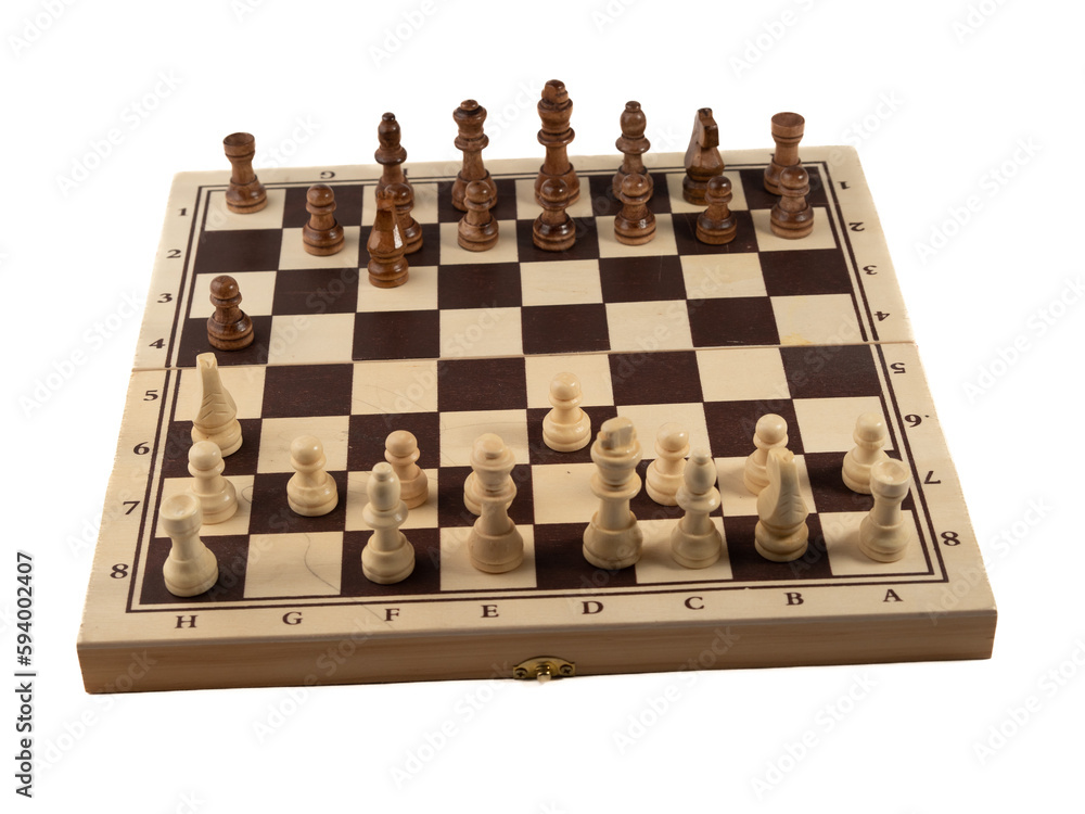 Wooden chess on a white background. Board game chess. Close-up. Wooden chess on a white background. Board game chess. Close-up.