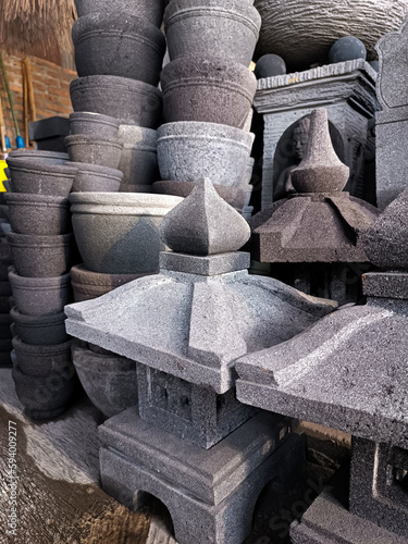 The natural stone carving handicraft products include the form of stupas, decorative lamps, arches, relief stone wall ornaments, fountains, lanterns and various interior element products. photo