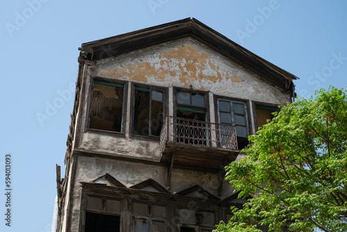 Historic house, wooden facade of a building ruin in old town of Damascus