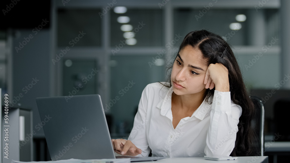Sad bored lazy young woman typing on laptop tired unmotivated businesswoman office worker feels fatigue from working at computer suffers from overwork distracted from boring dull job feeling exhausted Sad bored lazy young woman typing on laptop tired unmotivated businesswoman office worker feels fatigue from working at computer suffers from overwork distracted from boring dull job feeling exhausted
