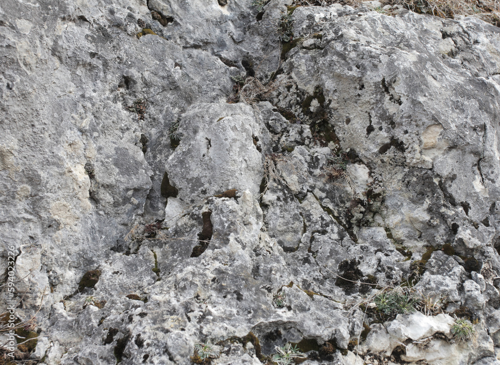 Foot soil - limestone material of volcanic origin, mountainous terrain, close-up. Foot soil - limestone material of volcanic origin, mountainous terrain, close-up.