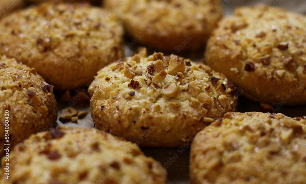 nut homemade cookies with almonds. Delicious sweet snack. food background, cookie texture close-up.