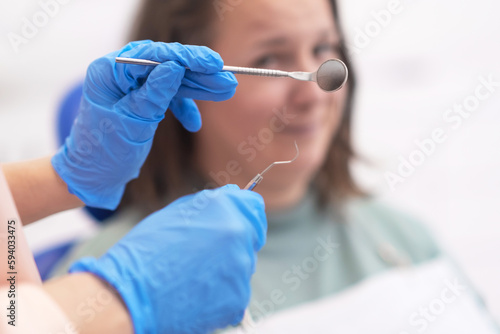 A close-up image of dental tools in action, dental equipment for results for our patients. Blurred background 