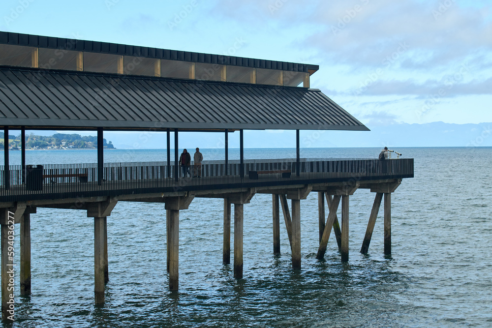 Puerto Montt, Chile - April 2023: Pier facing the Pacific Ocean in Puerto Montt, Chile Puerto Montt, Chile - April 2023: Pier facing the Pacific Ocean in Puerto Montt, Chile