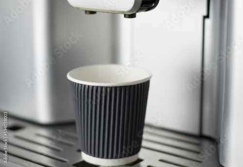 Paper cup in coffee machine