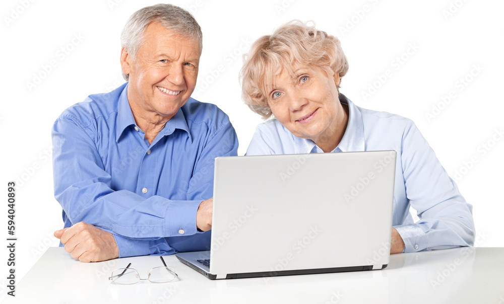 Portrait of happy senior couple with laptop on white Portrait of happy senior couple with laptop on white