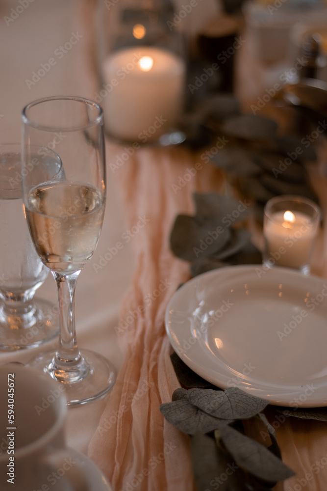 Boho style table setting with blush pink and beige linen Boho style table setting with blush pink and beige linen