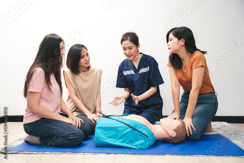 CPR Training ,Emergency and first aid class on cpr doll, Cardiopulmonary resuscitation, One part of the process resuscitation on unconscious person. photo