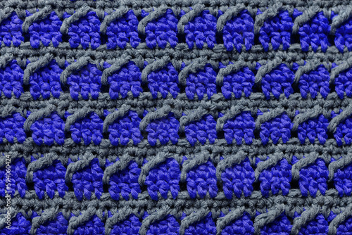 Blue grey seamless knitted texture. Volumetric crochet striped pattern. Knitted background. © Tanya
