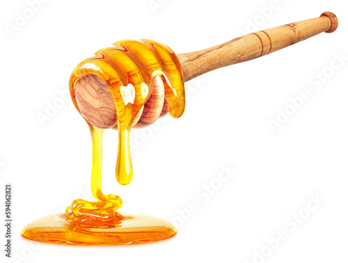 honey dripping with dipper isolated on white