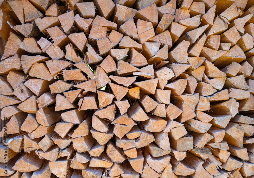 Firewood stacked as background. Dried organic firewood stack Firewood stacked as background. Dried organic firewood stack