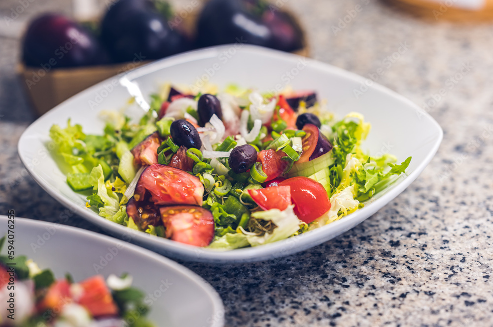 Salad with cherry tomatoes cheese and olives