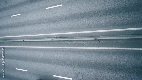 Aerial top view of traffic jam in the city. Many vehicles during peak hour.