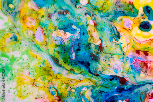 Abstract fluid art of bright colors and chaotic shapes. galaxy formation