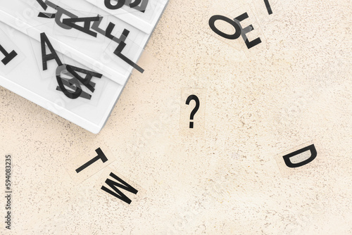 Board with letters and ques...