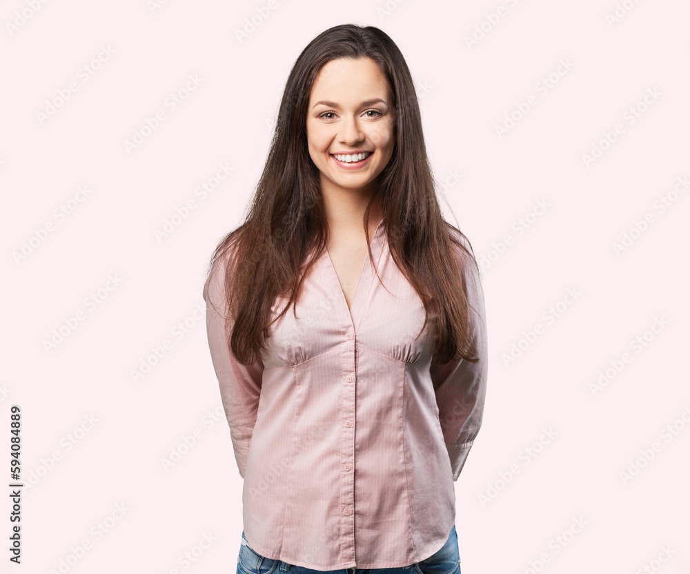 Happy young woman standing over background Happy young woman standing over background