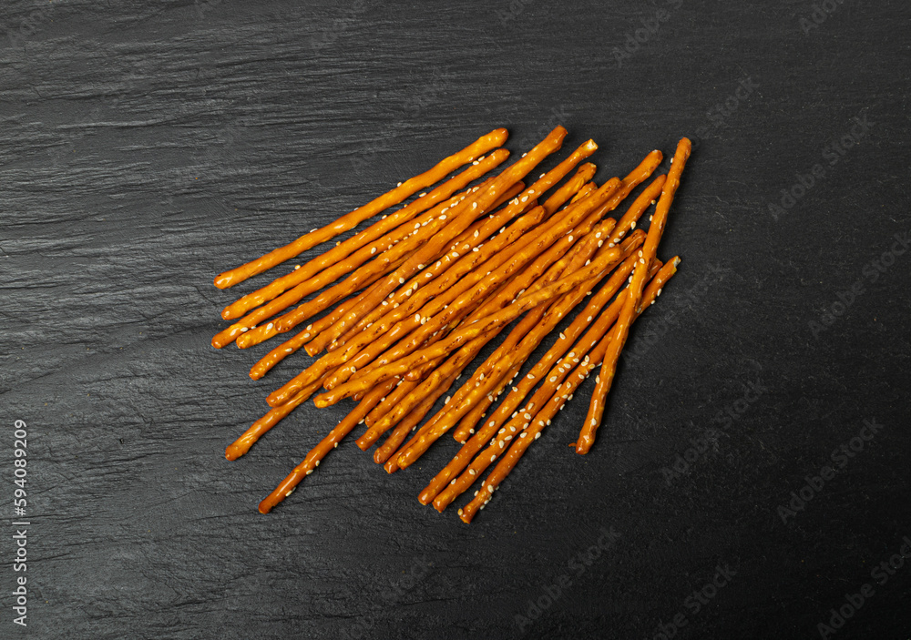 Bread Sticks, Pretzel Straws, Sesame Grissini, Pretzels Snack with Sesame Seeds, Long Rusks Bread Sticks, Pretzel Straws, Sesame Grissini, Pretzels Snack with Sesame Seeds, Long Rusks