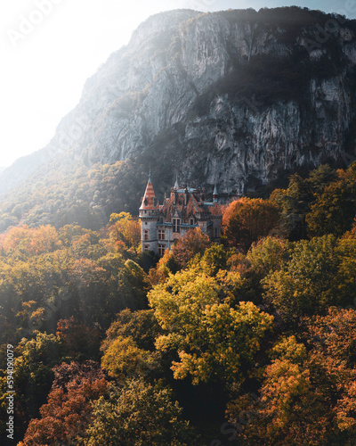 Fototapeta Imperial Castle hidden among the autumn
