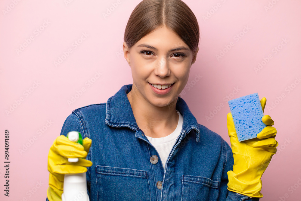 Cleaning company worker in overalls, yellow gloves and cleaning supplies Cleaning company worker in overalls, yellow gloves and cleaning supplies