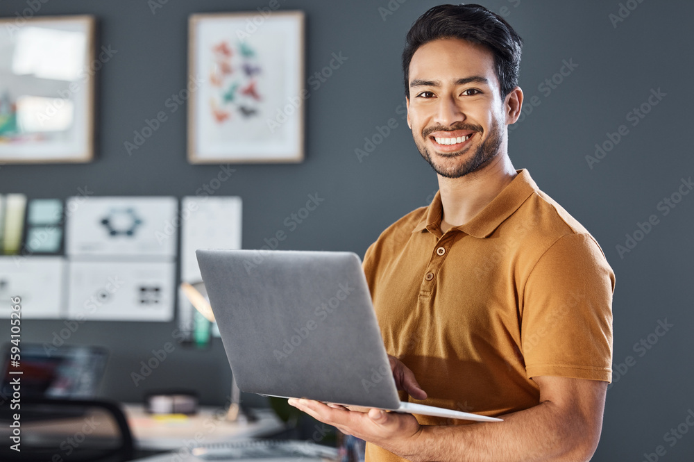 Portrait, laptop and happy man in office smile, confident and excited against blurred wall background. Face, smile and asian businessman online for planning, goal and design agency startup in Japan Portrait, laptop and happy man in office smile, confident and excited against blurred wall background. Face, smile and asian businessman online for planning, goal and design agency startup in Japan