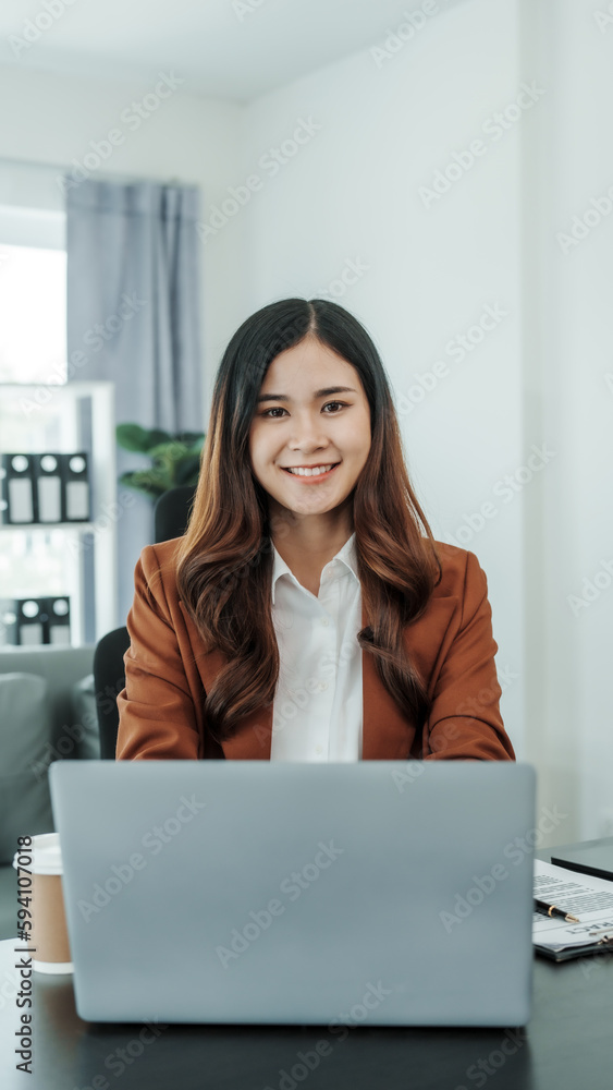 Looking camera, Online consulting with laptop in office of asian thai japanese chinese female exclusive lawyer legal advisor, legislation, saleswoman, legal contract documents Looking camera, Online consulting with laptop in office of asian thai japanese chinese female exclusive lawyer legal advisor, legislation, saleswoman, legal contract documents