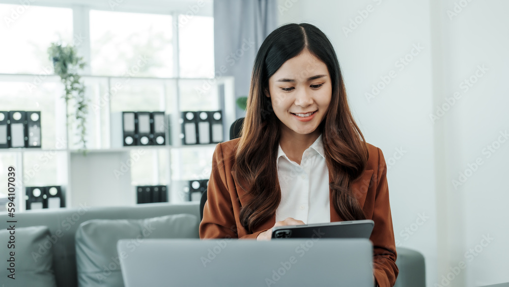 Using tablet pc, Online consulting with laptop in office of asian thai japanese chinese female exclusive lawyer legal advisor, legislation, saleswoman, legal contract documents Using tablet pc, Online consulting with laptop in office of asian thai japanese chinese female exclusive lawyer legal advisor, legislation, saleswoman, legal contract documents