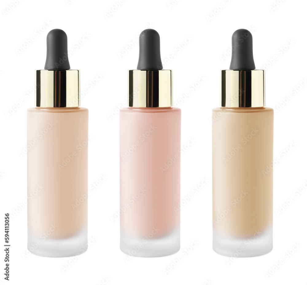 Set of liquid foundations in different shades isolated on white Set of liquid foundations in different shades isolated on white