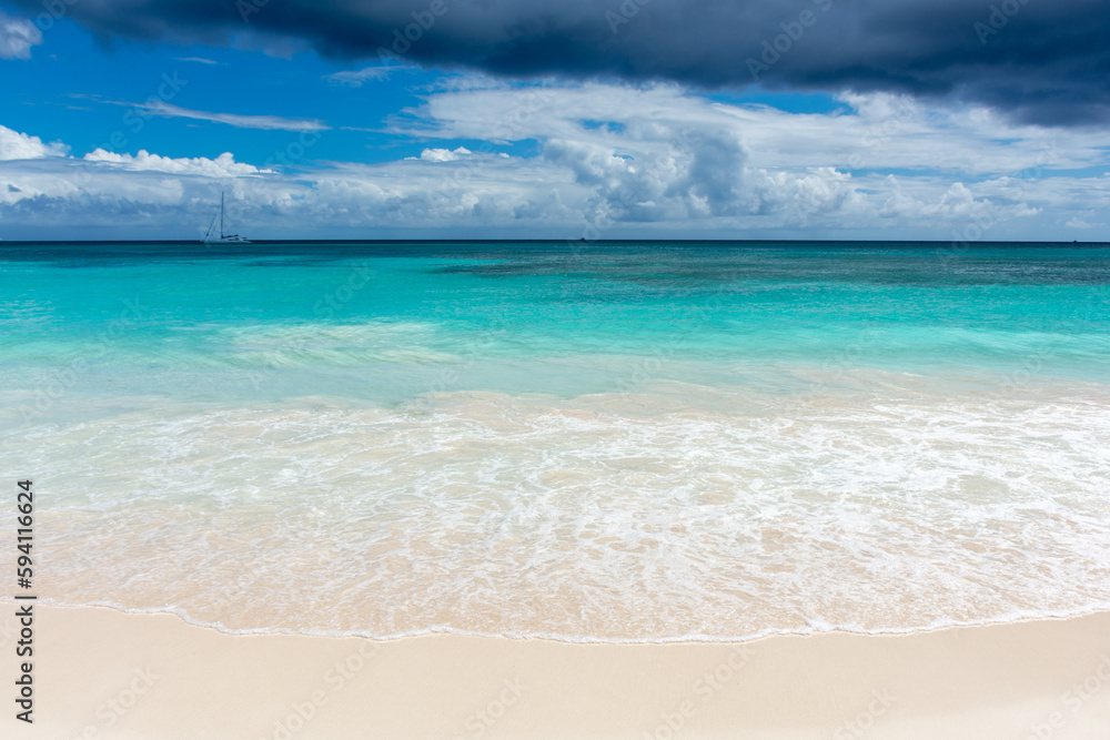 Fototapeta premium Dominican Republic, beautiful Caribbean coast with turquoise water and palm trees.