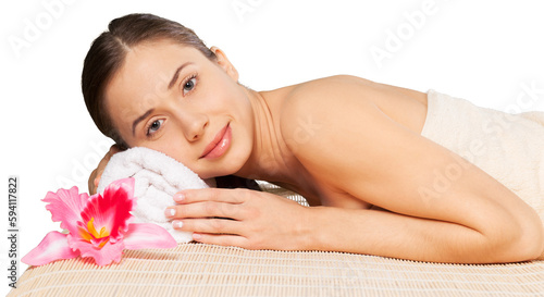 Beautiful and healthy woman relaxing in spa salon